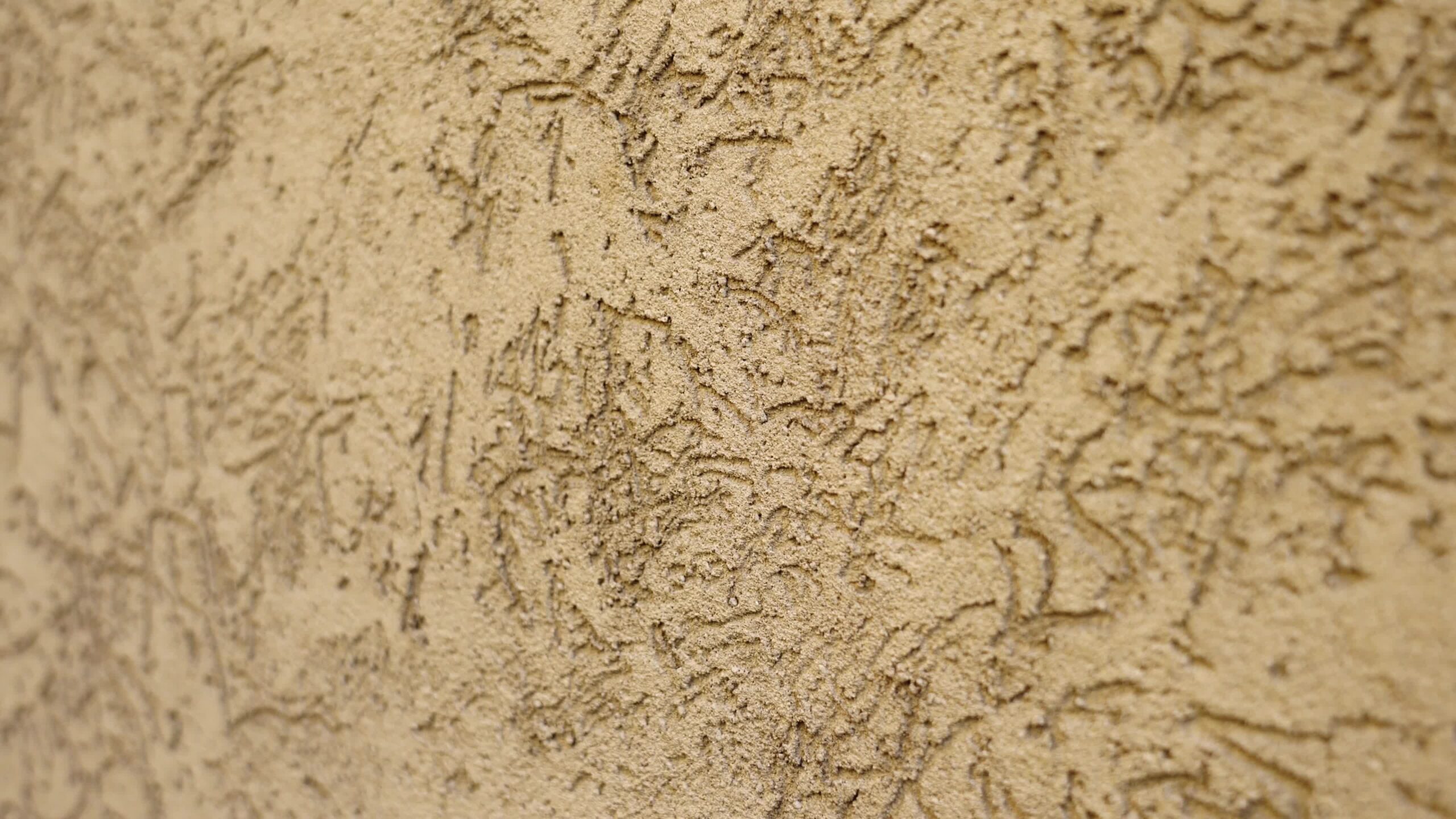 Local architectural landmark brown stone wall with patterns