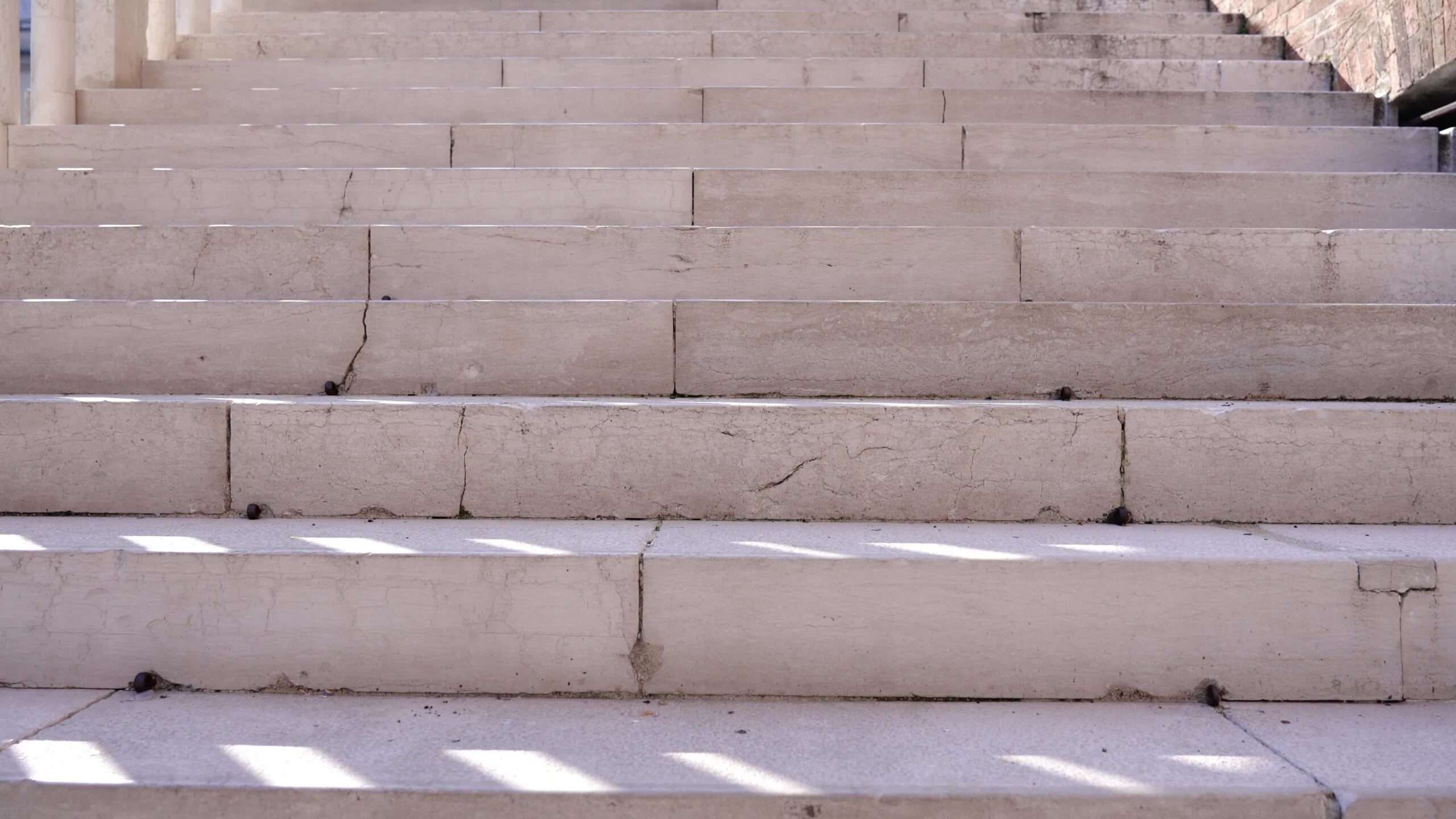 Climb the ancient concrete stairs