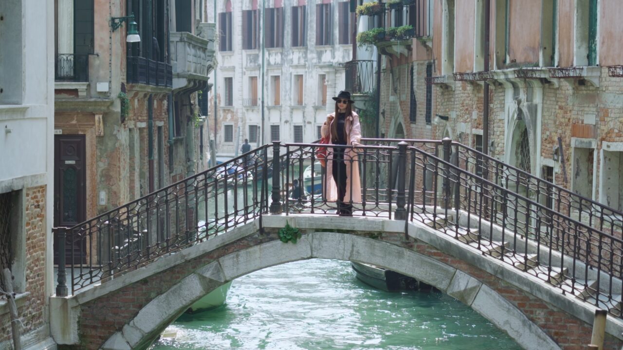 Woman walks through Venice