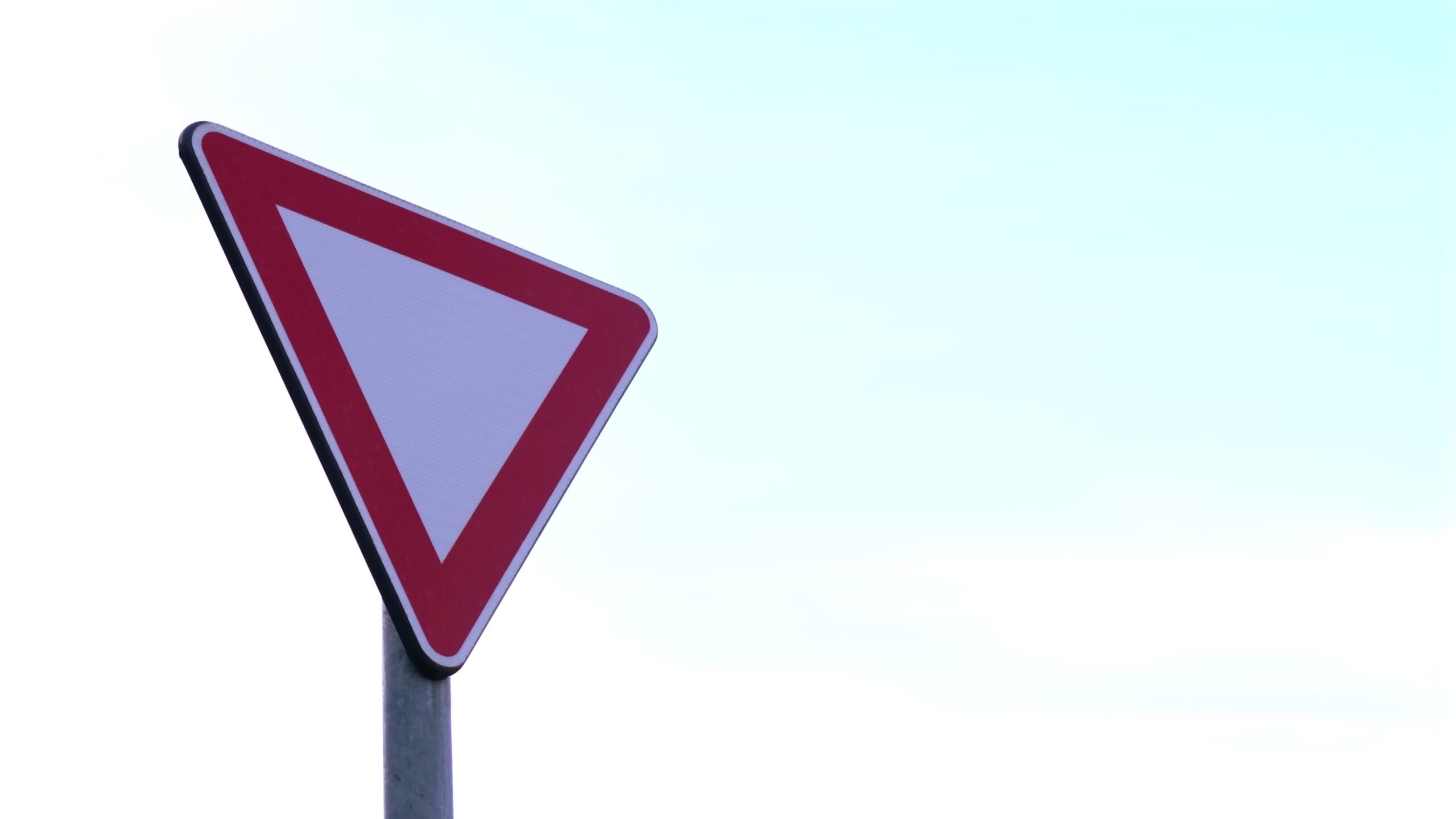 Triangle sign pointing down
