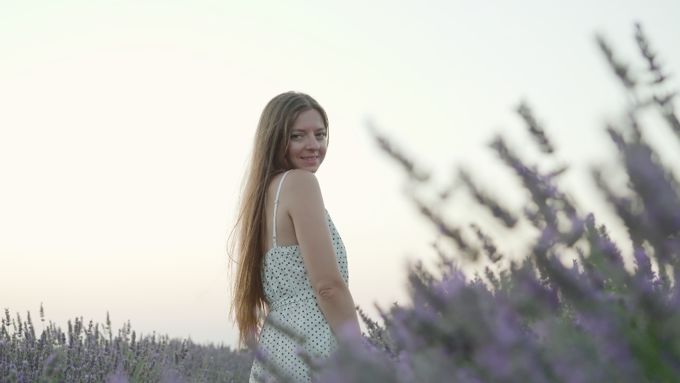 Woman smiles in lavender