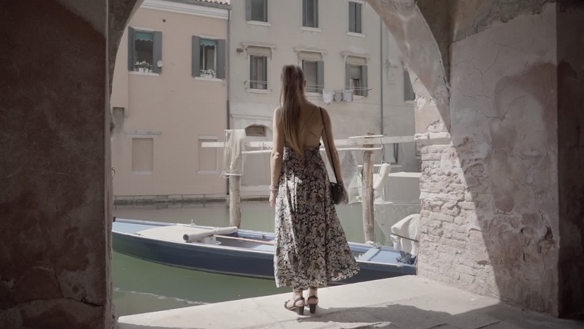 Woman with elegant dress in Venice