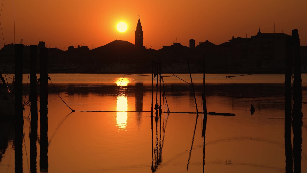 Sunset on the lagoon of the city of Chioggia