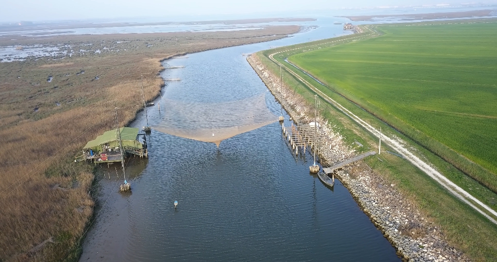 Aerial view of a fishing net above the river