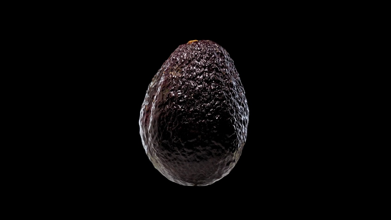 Avocado lucido su sfondo nero+
