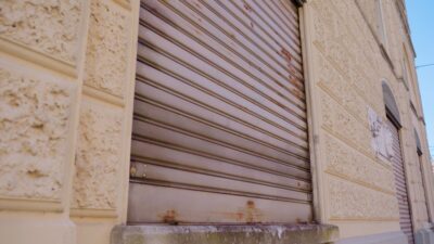 Closed shutter of a large building window