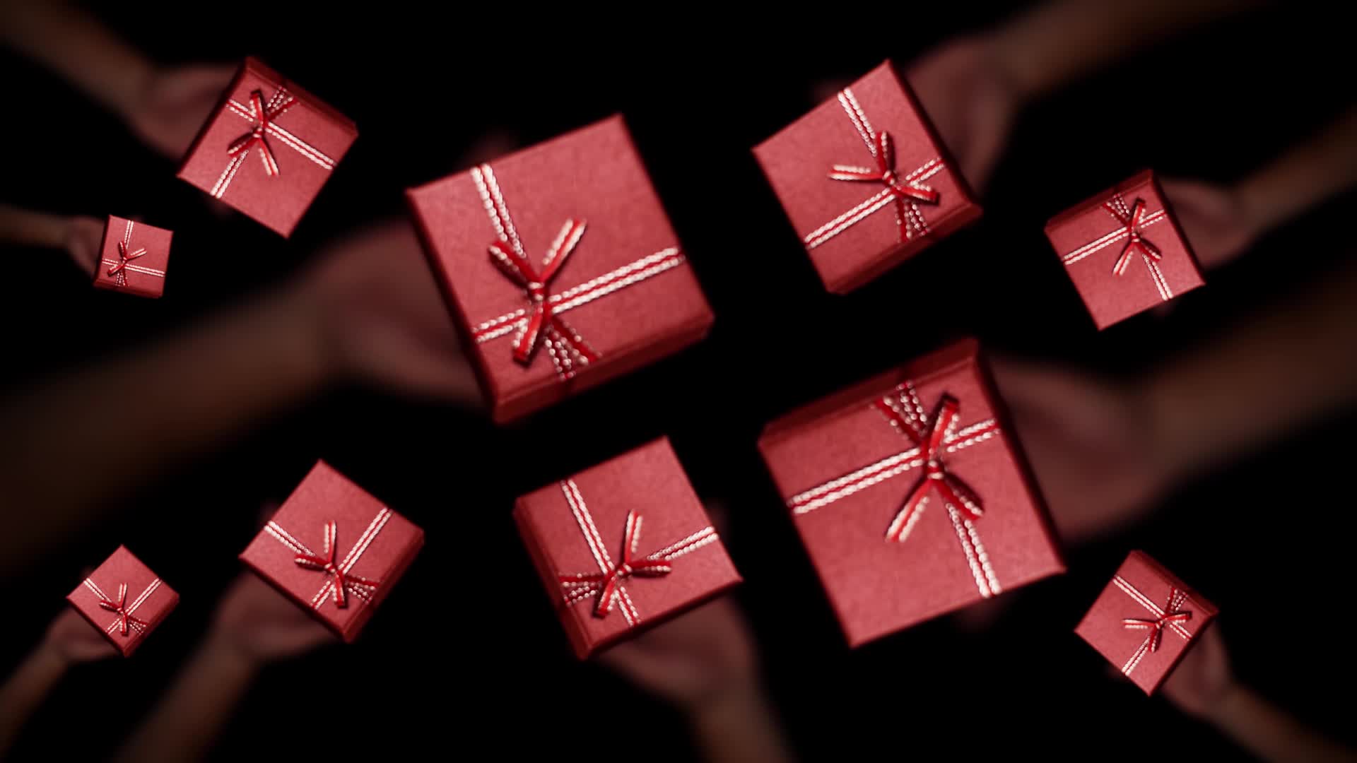 Piccoli pacchetti da regalo gettati in alto in slow motion