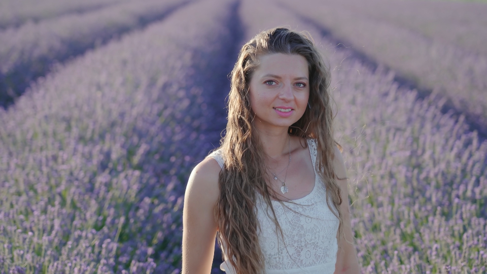 Young woman smiles