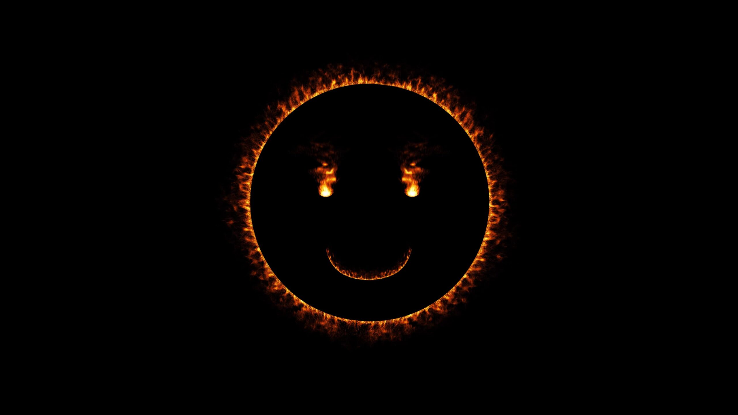 Fire happy smiley on black background