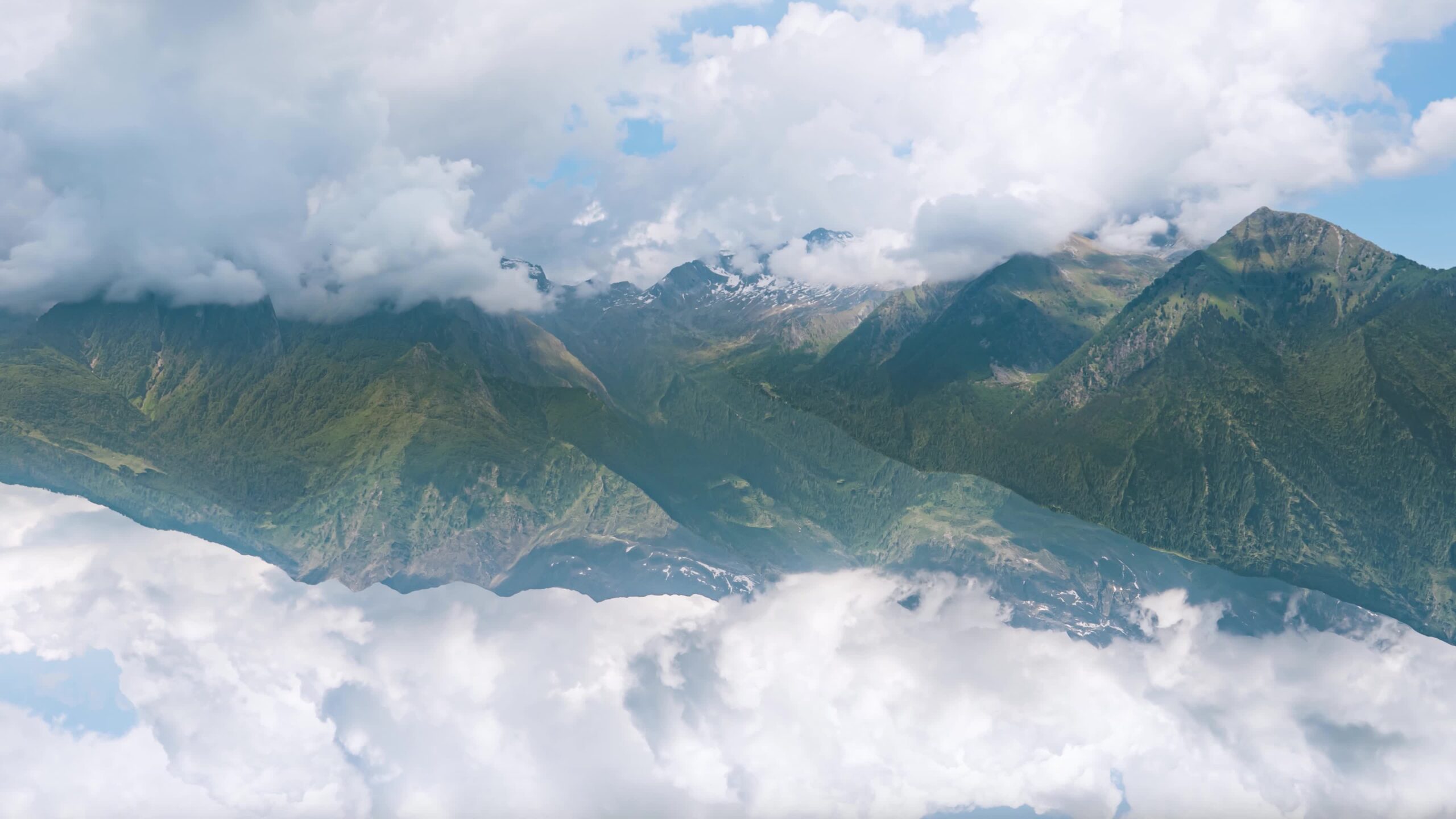 Mountain in the sky among clouds