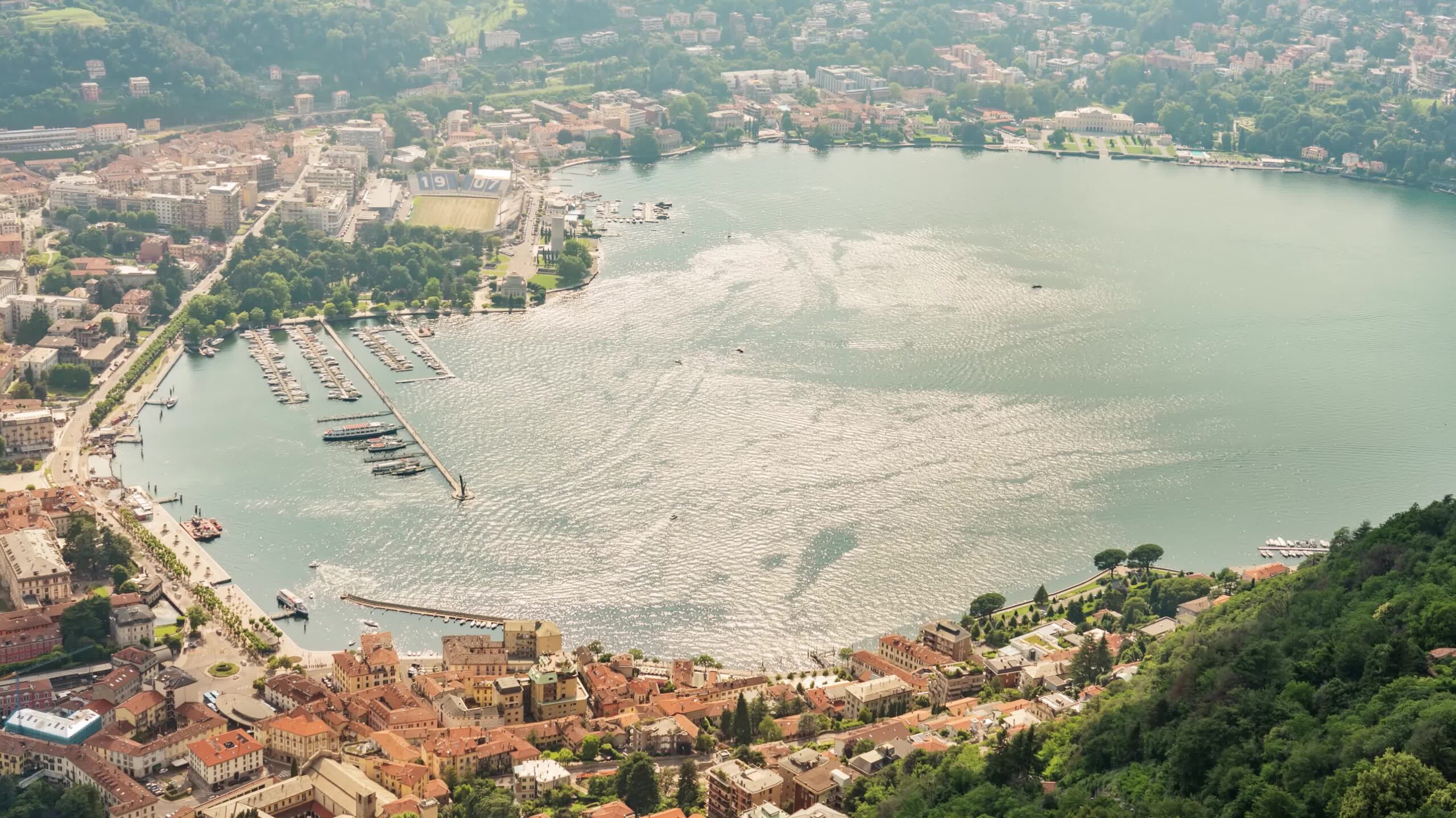 Como port with moving boats in timelapse