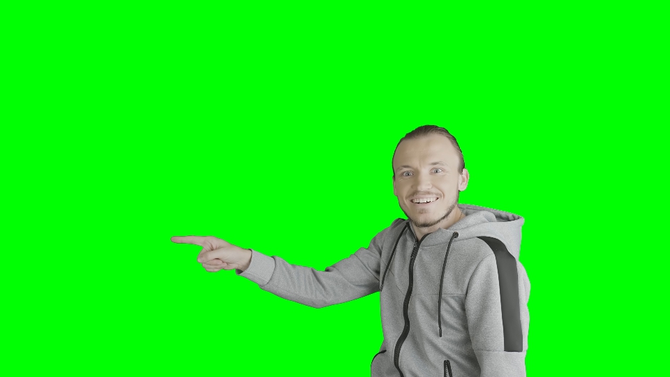 Uomo indica sul green screen