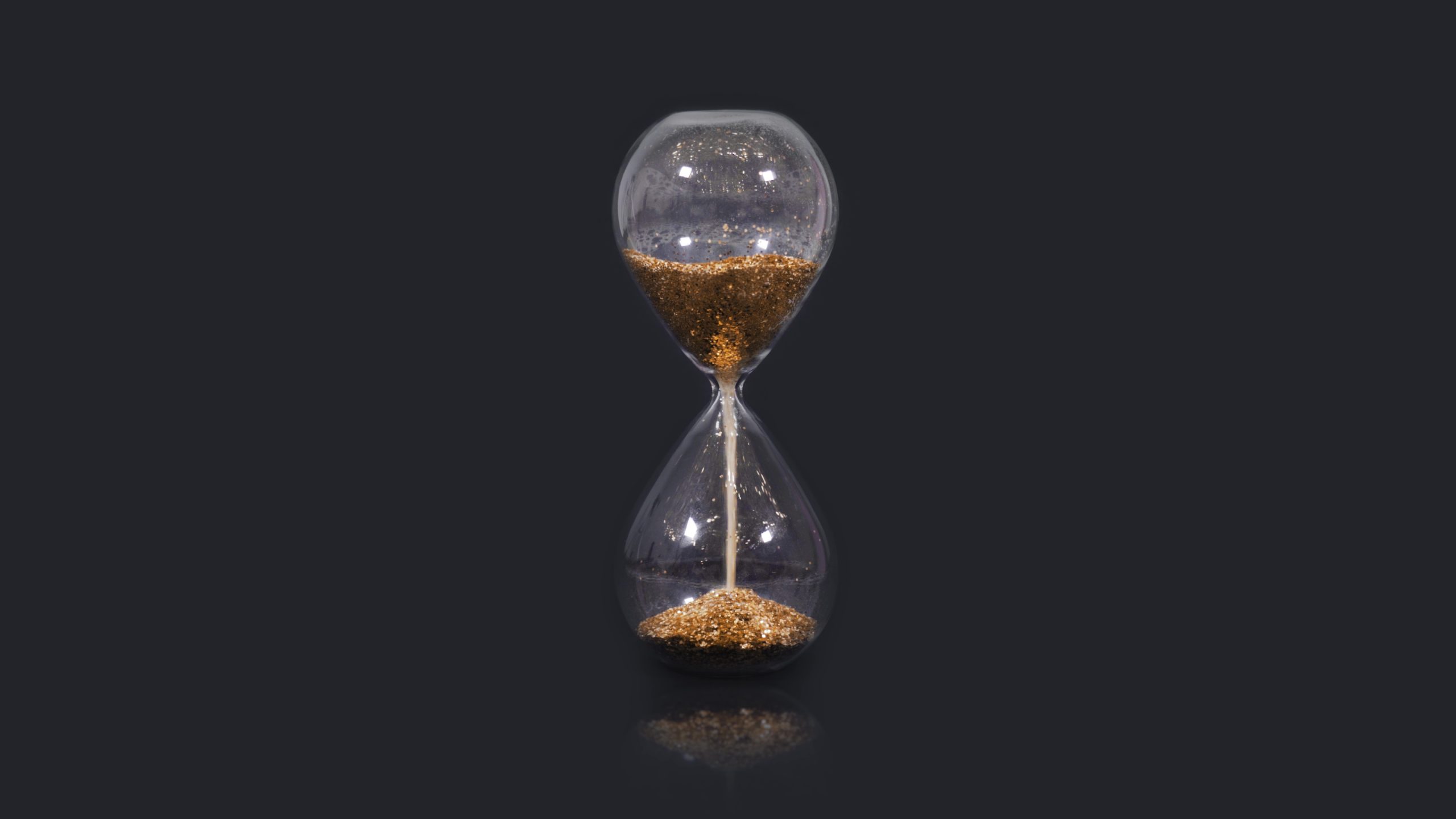 Hourglass on black background