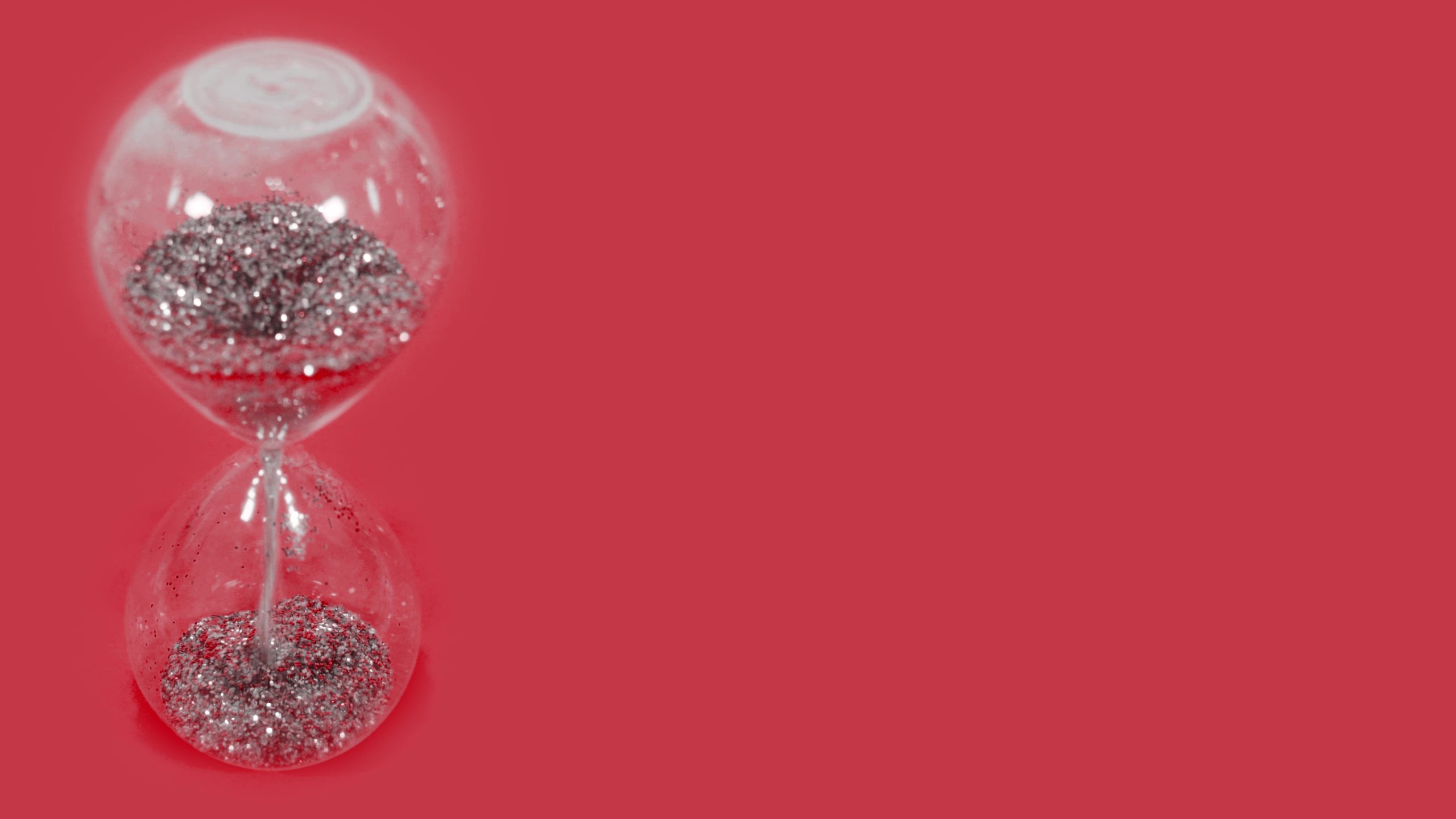Hourglass with red copy space