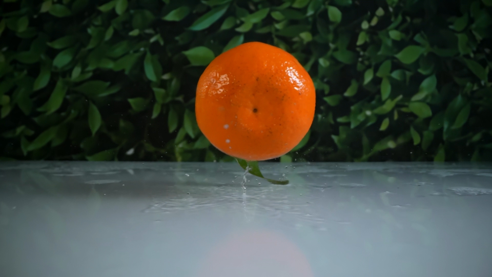 Slow-Motion Falling Mandarins
