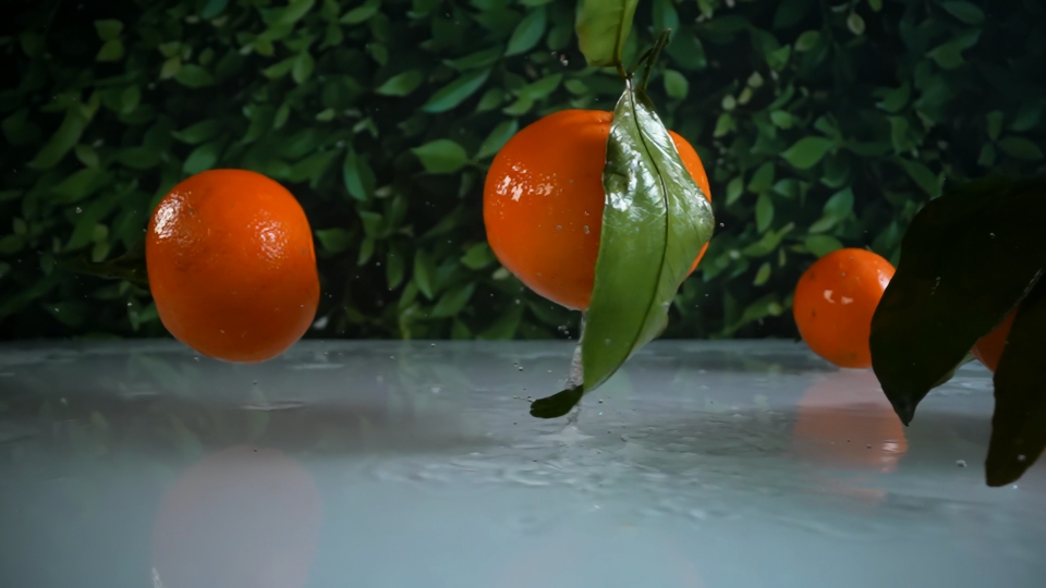 Slow Motion Clementine Drop