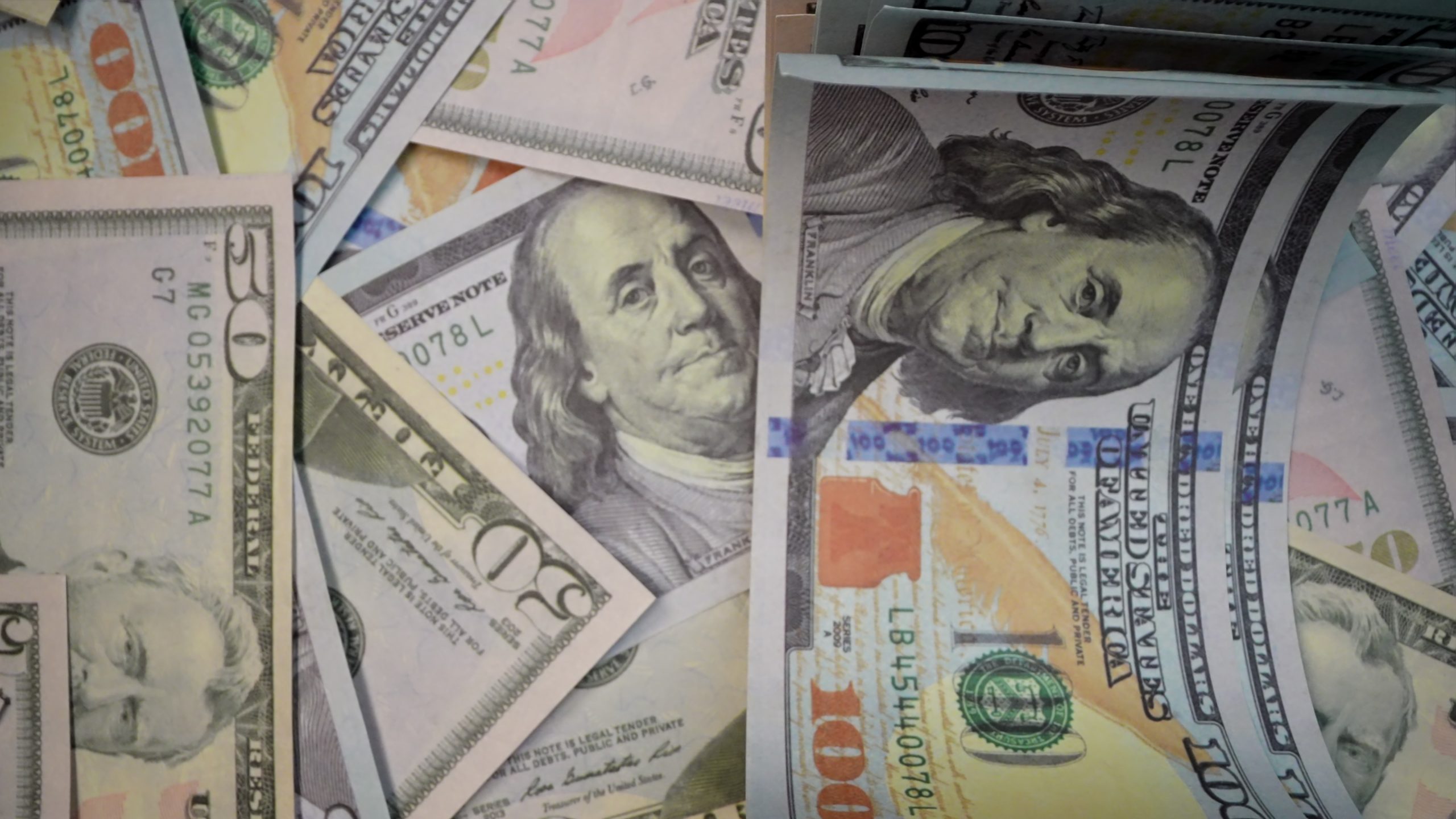 Banknotes are thrown by hand