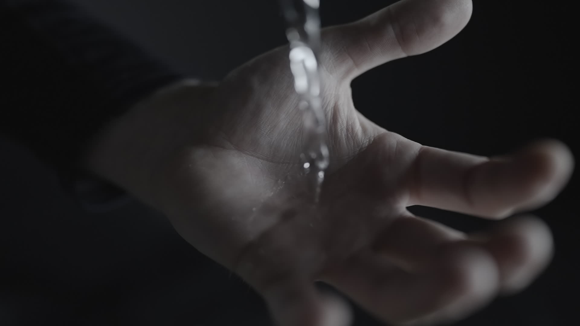 Open Hand with Water Flowing Down