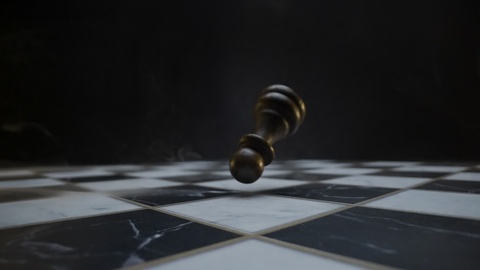 Falling Chess Piece on Checkered Floor