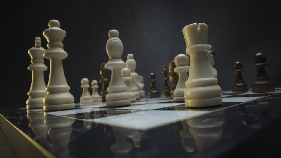 Chess Pieces Strategically Positioned on Board