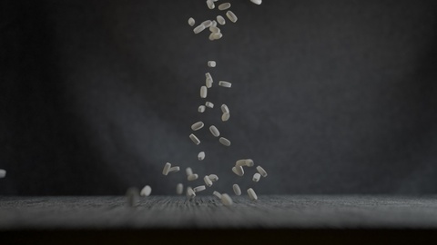 Rice grains falling in slow motion