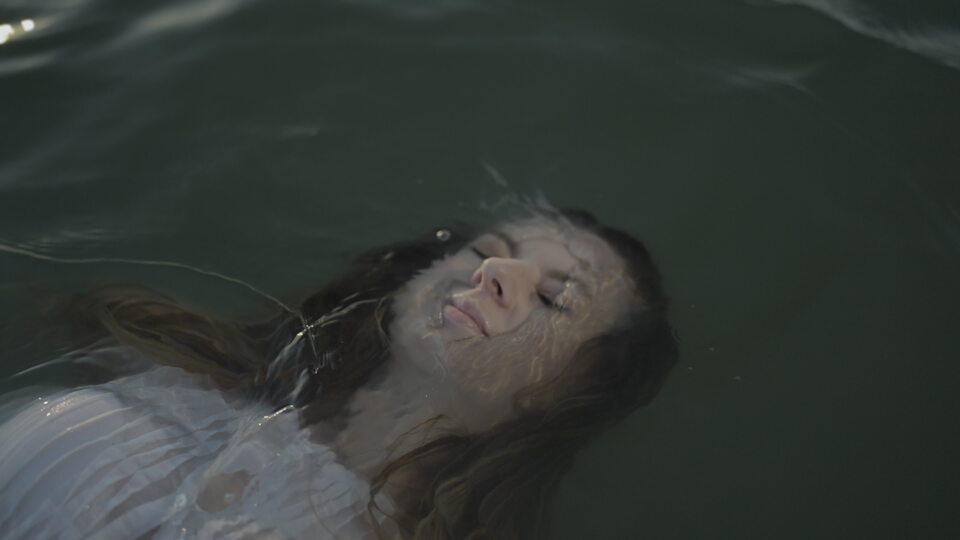 Woman Submerged Peacefully in Water
