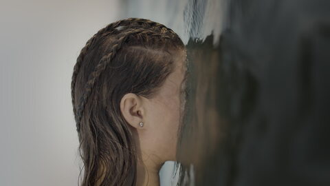 Woman with Face Submerged in Water