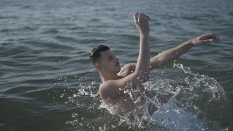 Person Falling Back into the Ocean with a Splash